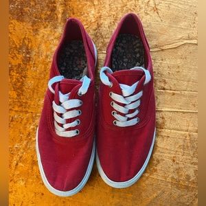 Red sneakers. Size 8. Lightly worn and in good condition.